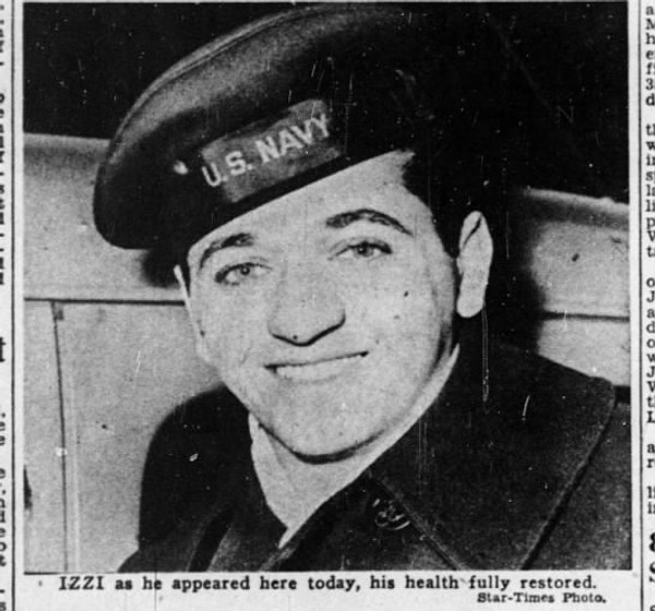 A young Basil Izzi wearing a big smile and a navy uniform.