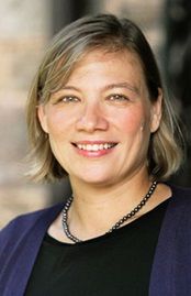 A professional headshot of Katherine looking directly at the camera.