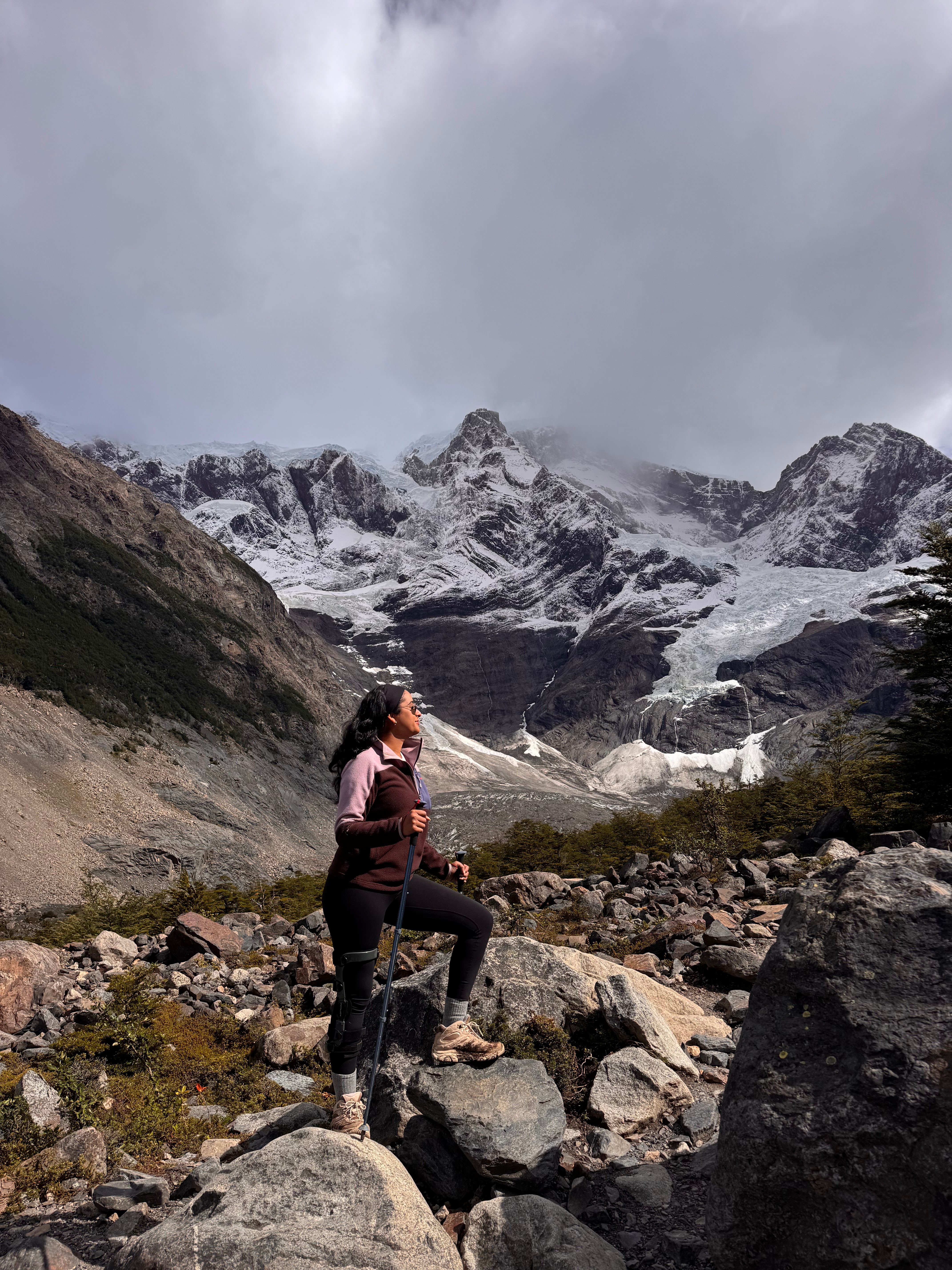 Marisa standing on a mountain in Patagonia, Chile.