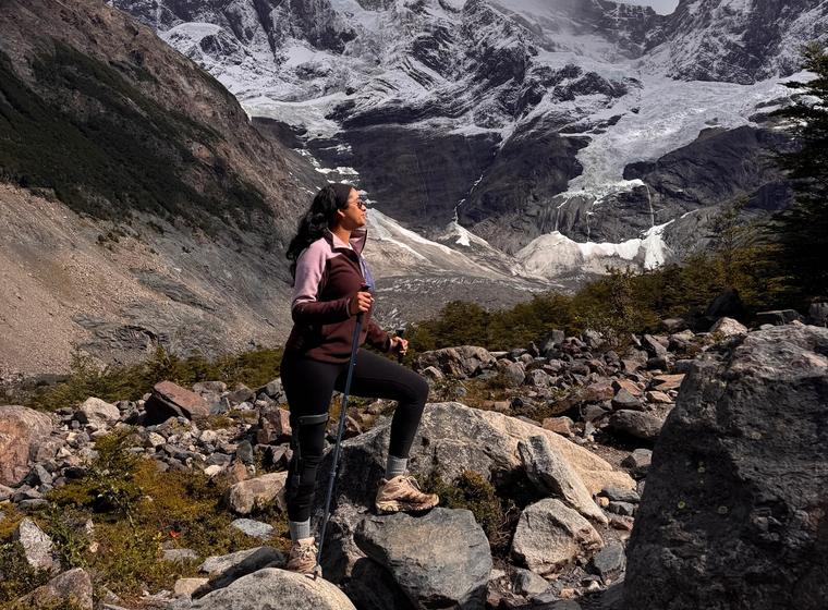 Marisa standing on a mountain in Patagonia, Chile.