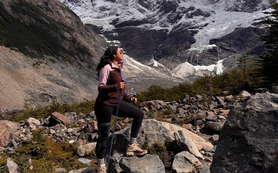 Marisa standing on a mountain in Patagonia, Chile.