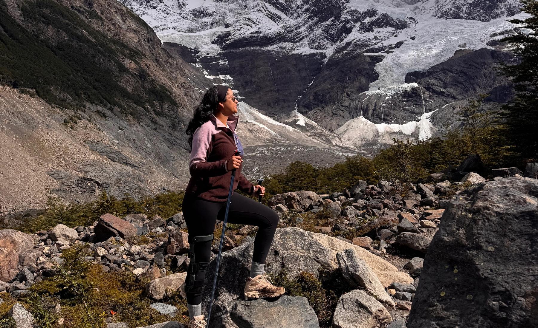 Marisa standing on a mountain in Patagonia, Chile.