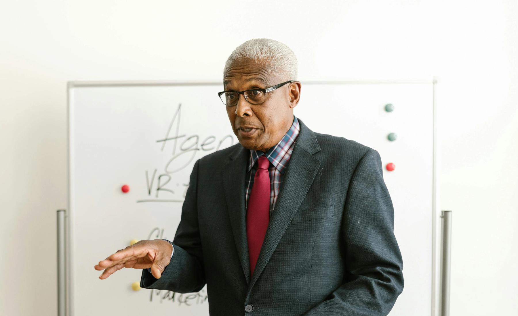 Senior woman walking independently in a park after recovering from a fall with physiotherapy