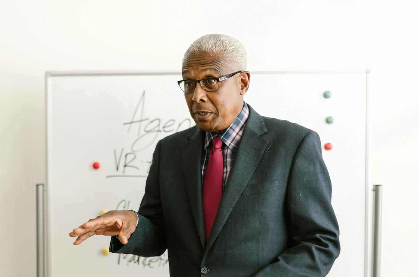 Senior woman walking independently in a park after recovering from a fall with physiotherapy