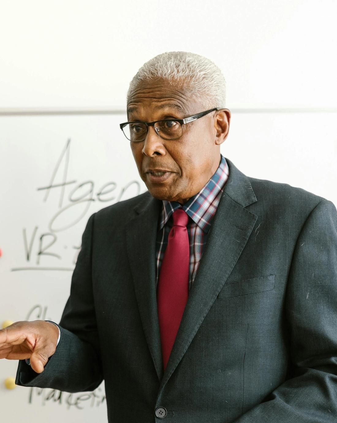 Senior woman walking independently in a park after recovering from a fall with physiotherapy