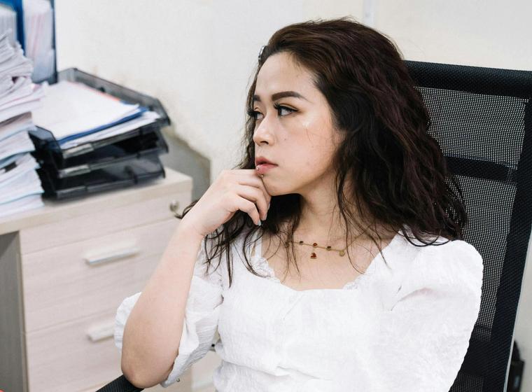 Priya S. sitting in an office.