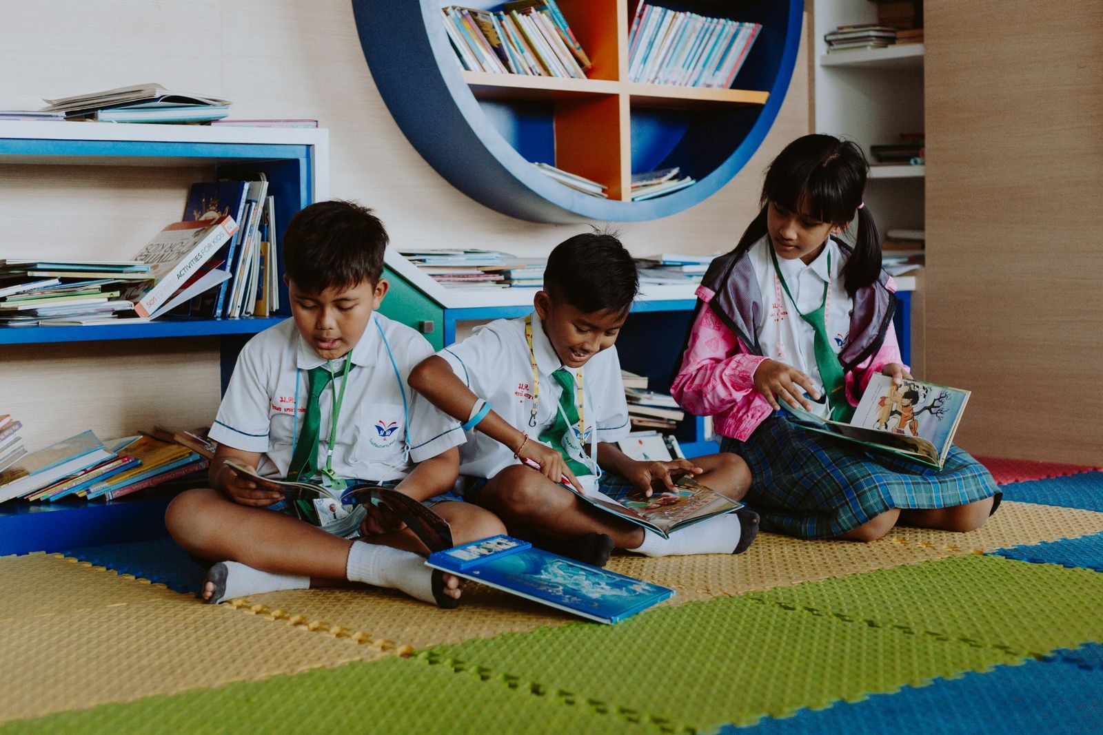 Primary school children reading together