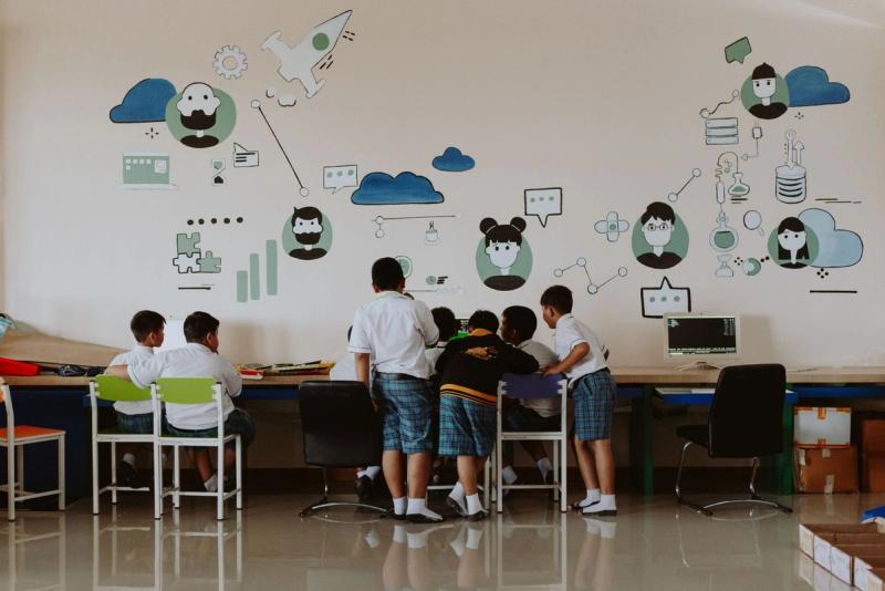 Students working at computers in an ICT lab