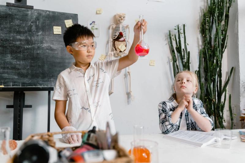 Students conducting a science experiment in a school lab