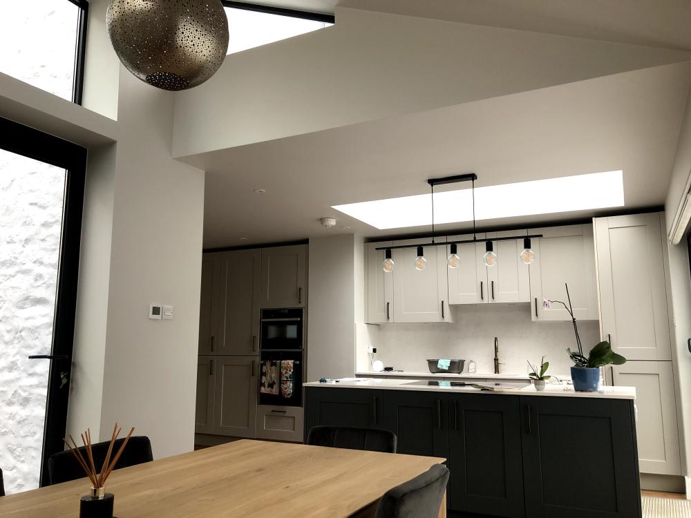 Shot inside the home overlooking kitchen work top areas