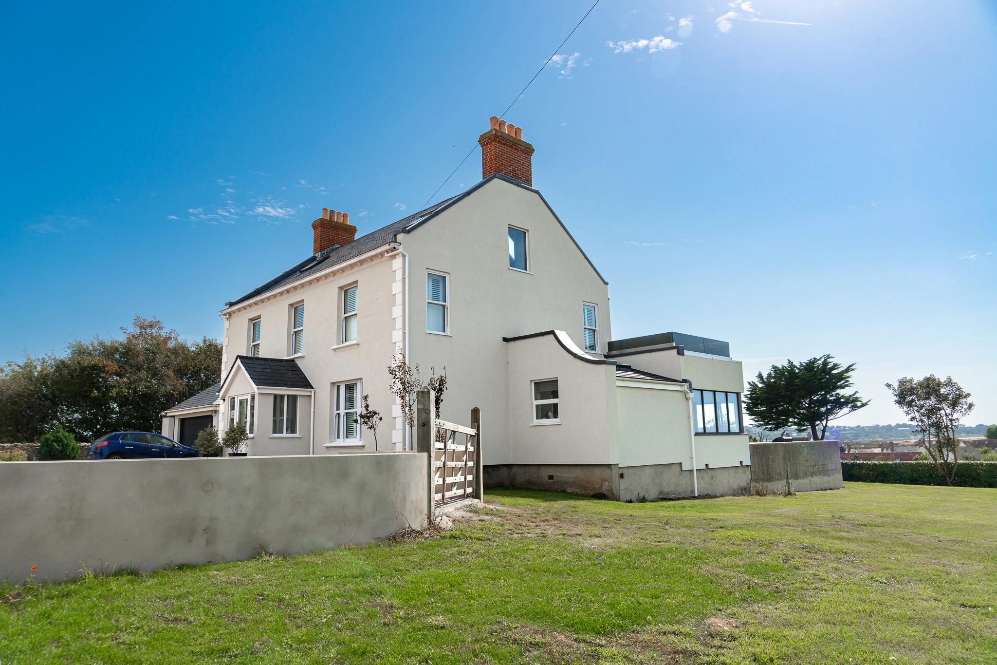 Nice right hand side view of La Croute property exterior