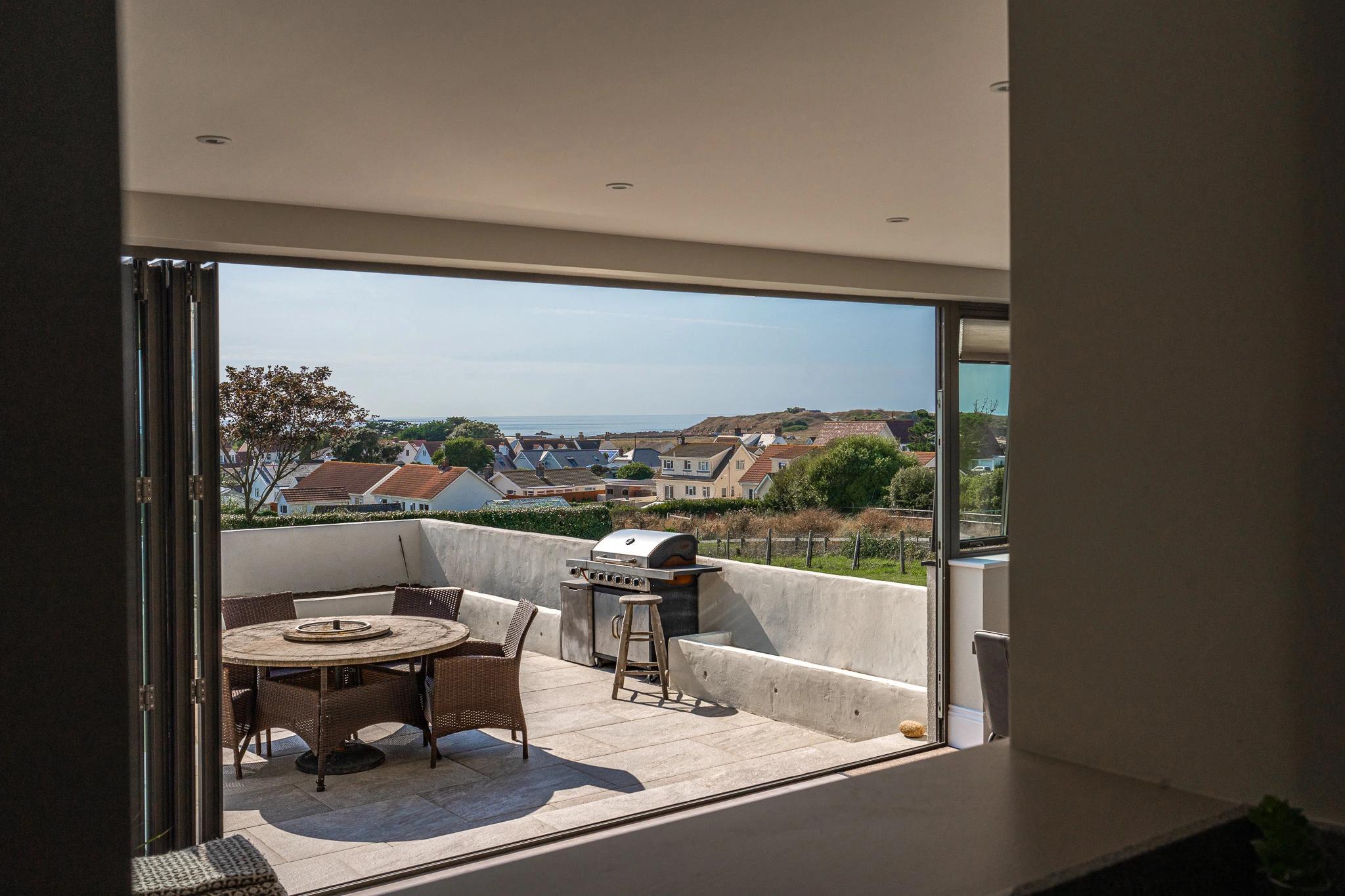 Interior shot of La Croute looking out onto balcony