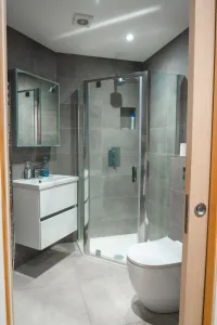 Interior shot of modern grey bathroom
