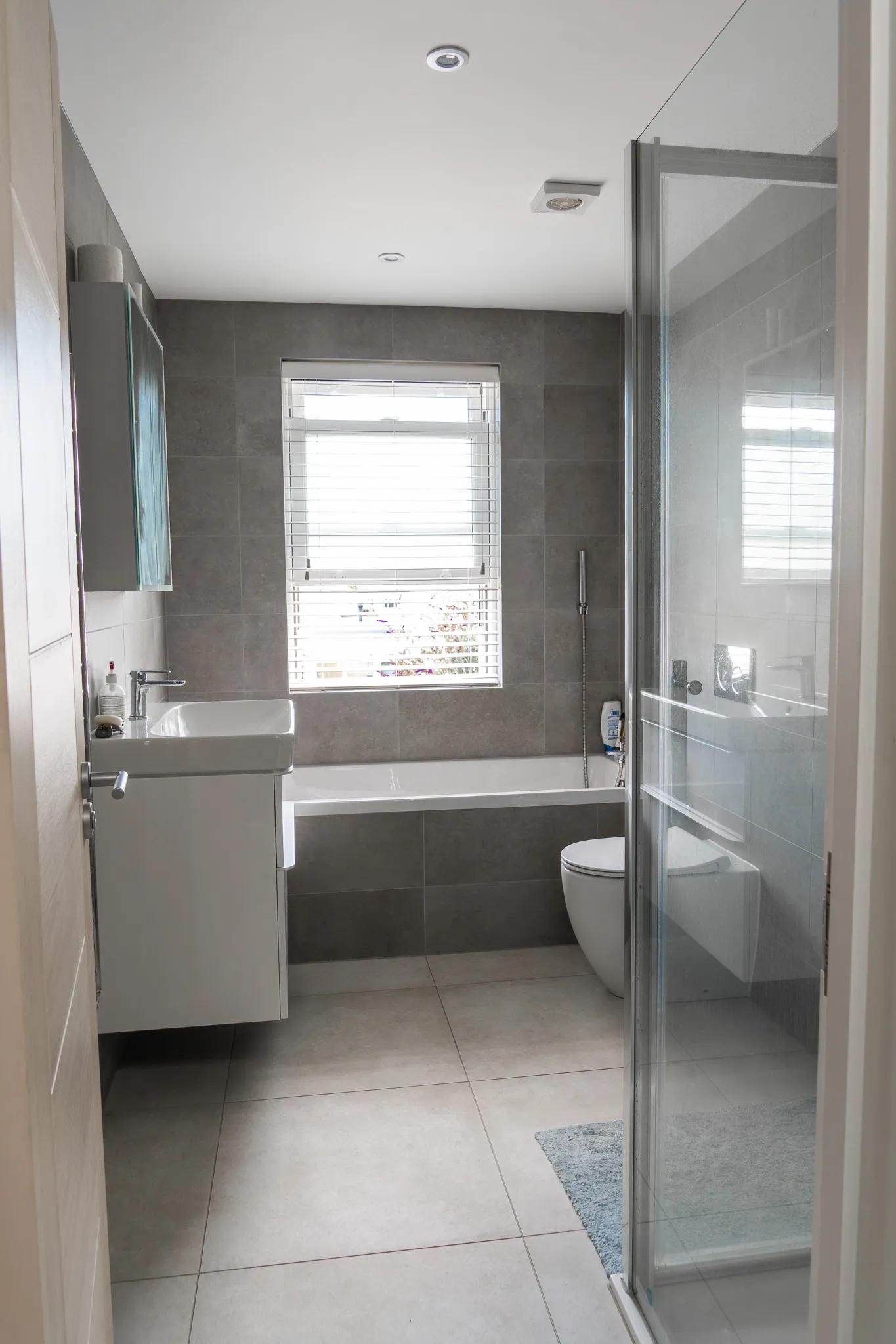 Interior shot of modern grey bathroom 2