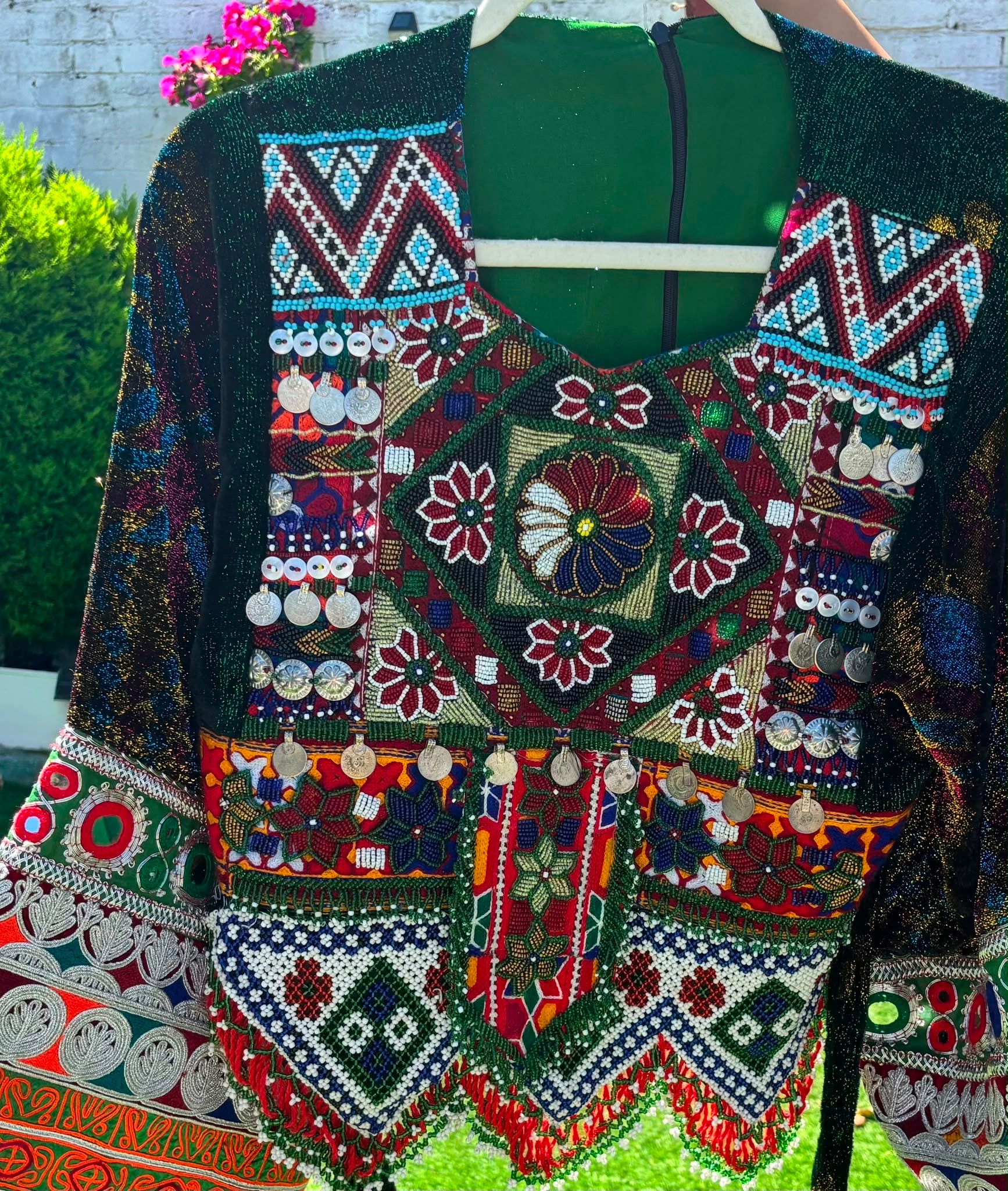 Green velvet Afghan waistcoat with beadwork and silver coins