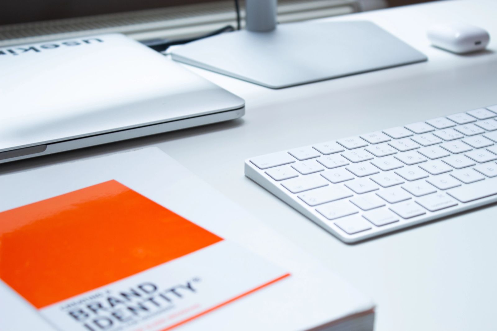 Photo of book and computer keyboard.