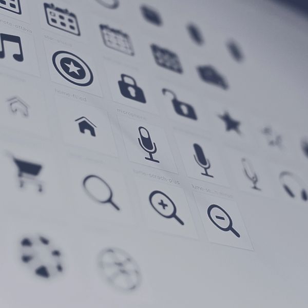 White photo paper with printed icons in black and white.