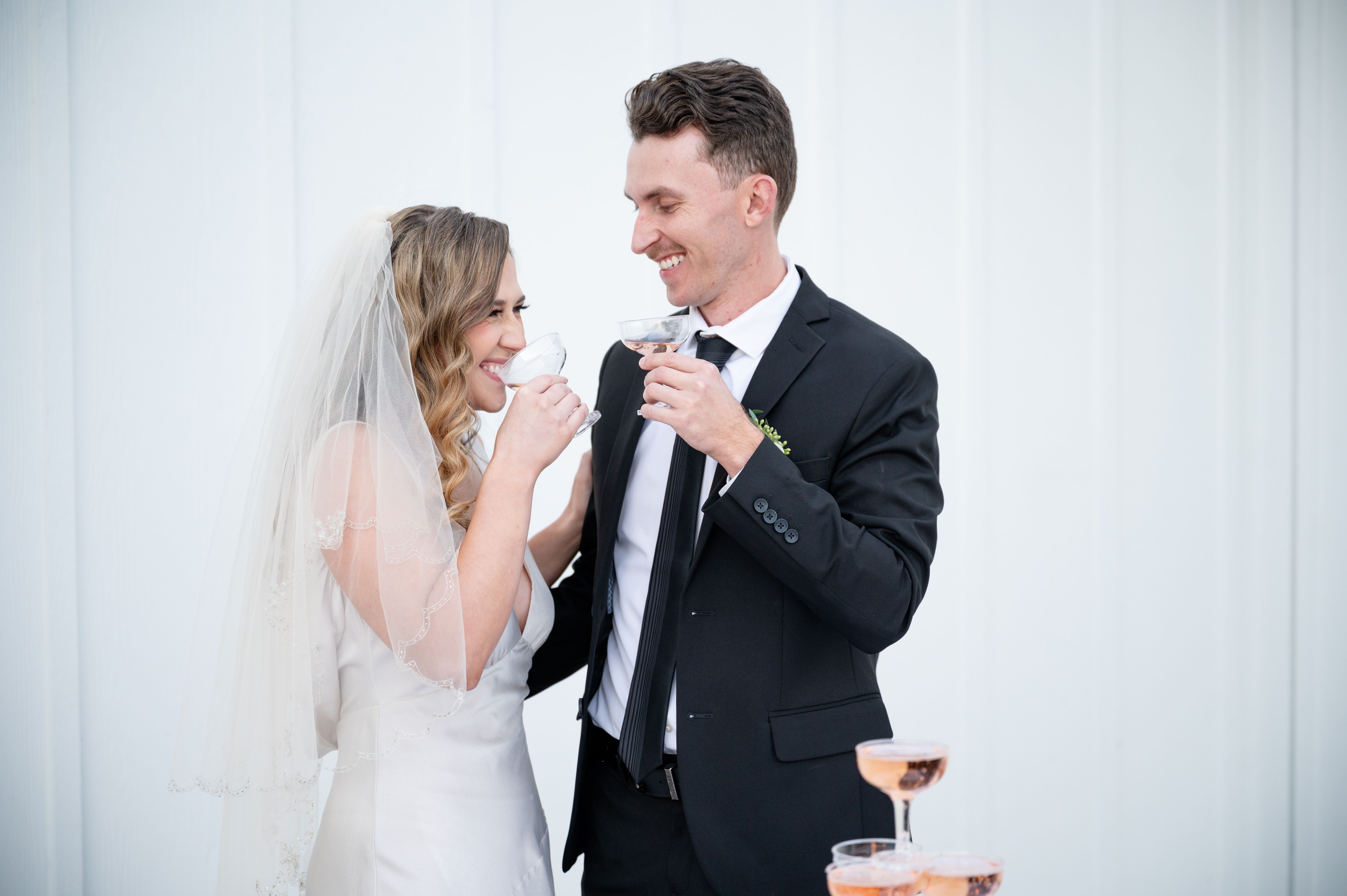 Wedding couple kissing and holding each other