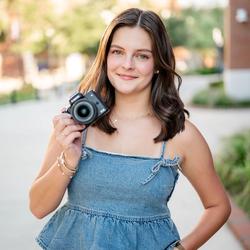 Associate photographer Katie Grace smiling at the camera