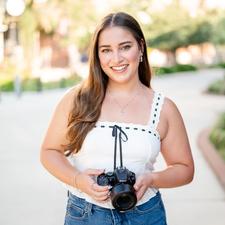 Selected photographer smiling at the camera