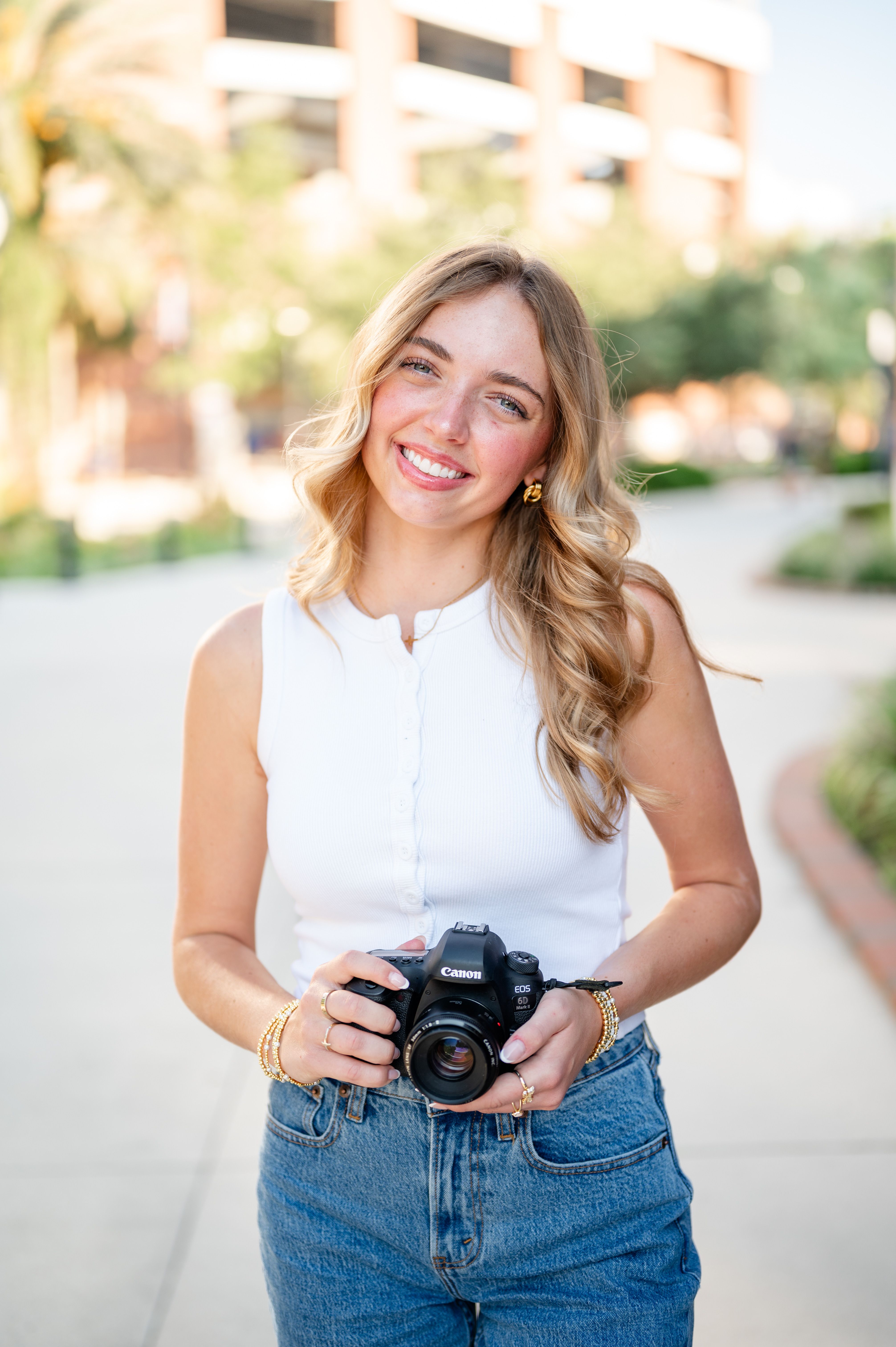 Associate photographer Haley smiling at the camera