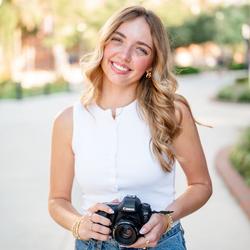 Associate photographer Haley smiling at the camera