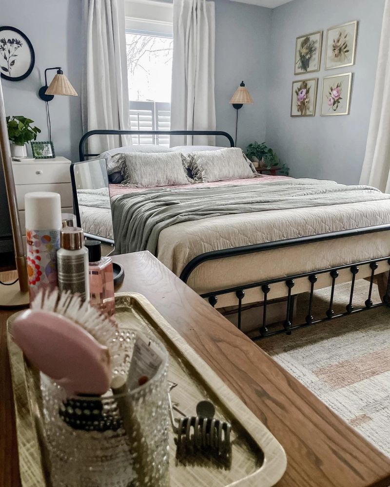 Peaceful vintage farmhouse bedroom retreat with decluttered storage solutions