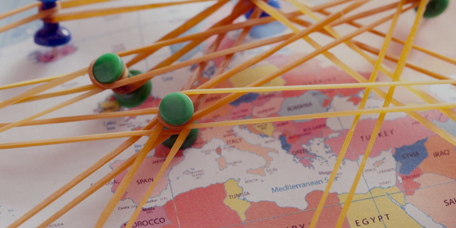 world map with string connections for representing automated invoice capabilities