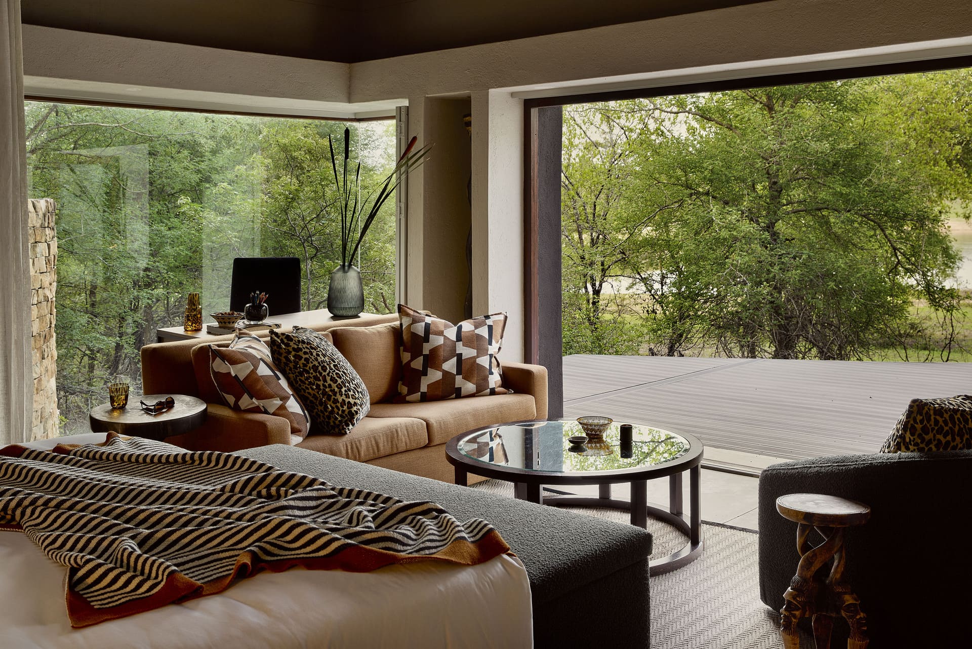 The lounge at the exclusive-use, Chitwa House, offers stunning views of Chitwa Dam.