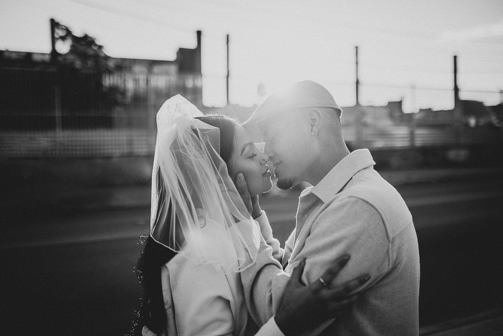 Couple during urban elopement in east williamsburg brooklyn