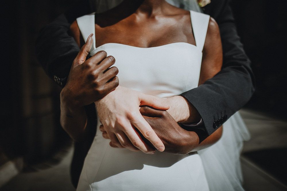 Interracial bride and groom at nyc wedding in theatre district