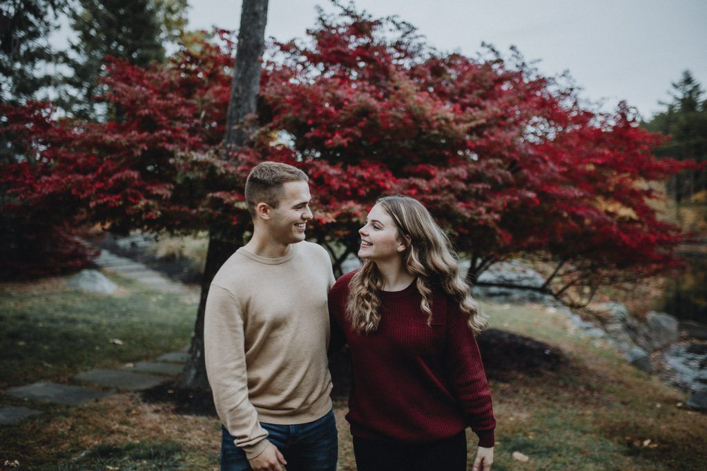 Couple during fall engagement photoshoot in west point