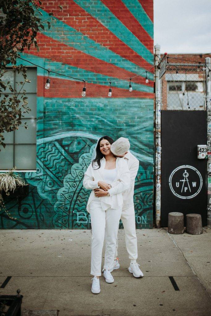 Couple during urban elopement in east williamsburg brooklyn