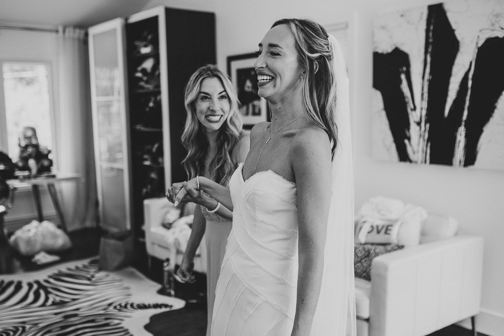 Bride getting ready before backyard wedding in the hamptons
