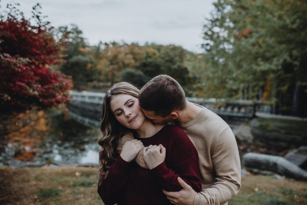 Couple during fall engagement photoshoot in west point