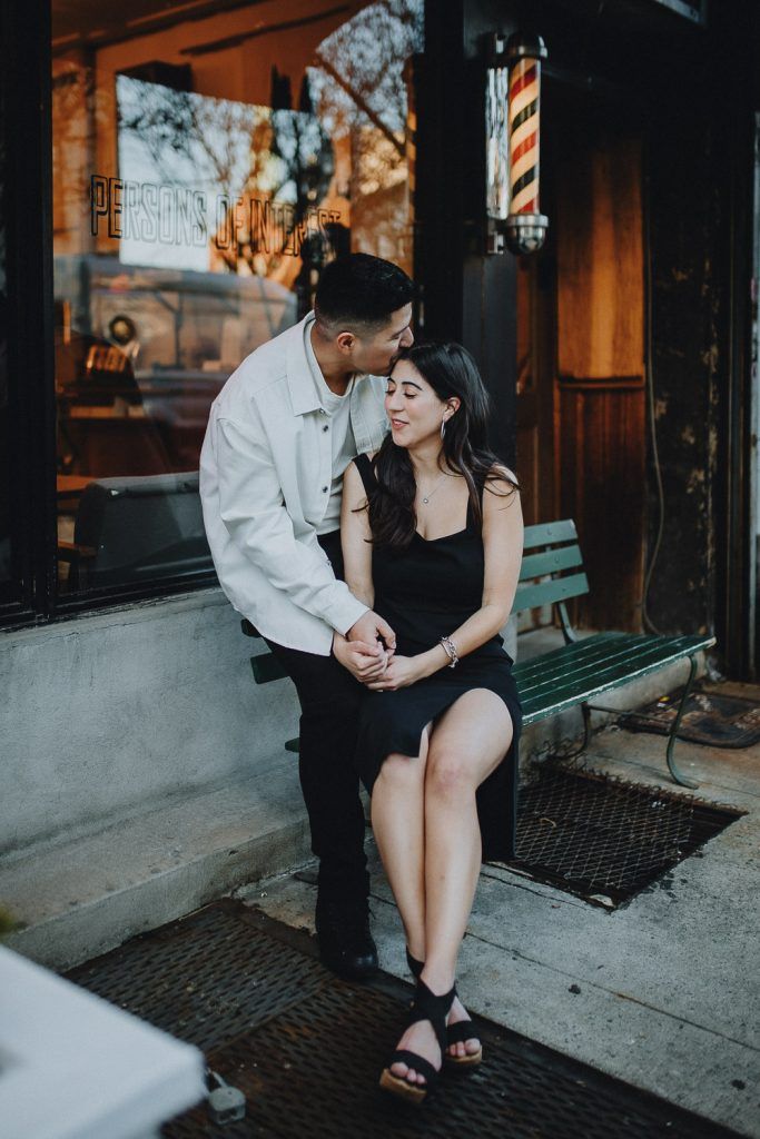 Couple during engagement photo session in williamsburg brooklyn