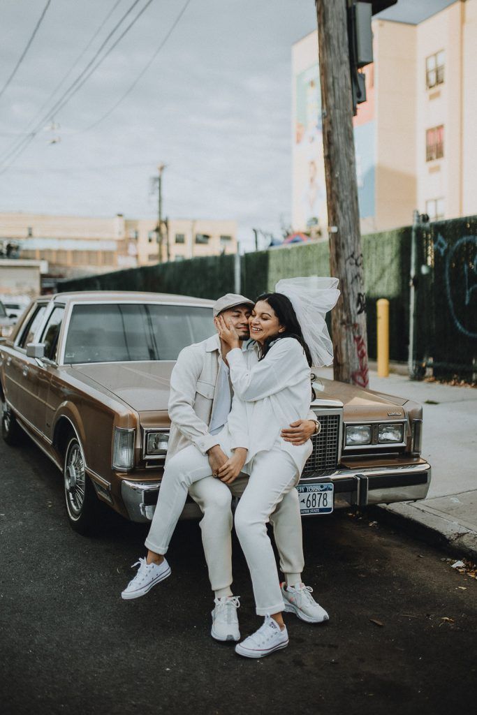 Couple during urban elopement in east williamsburg brooklyn