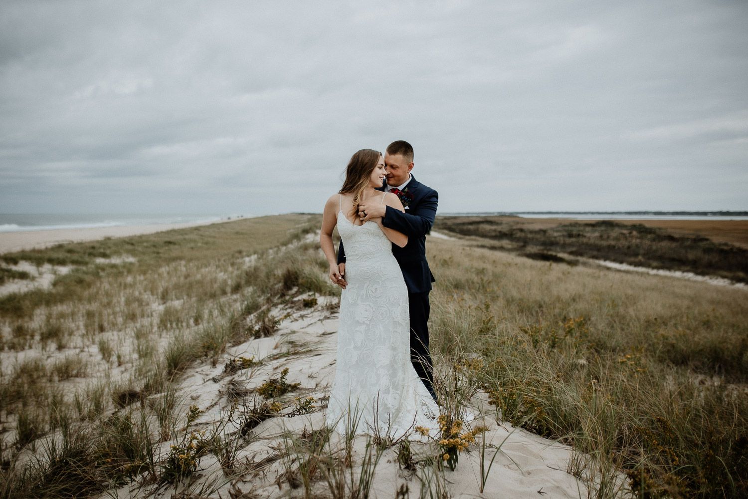 Bride and groom during long island beach elopement