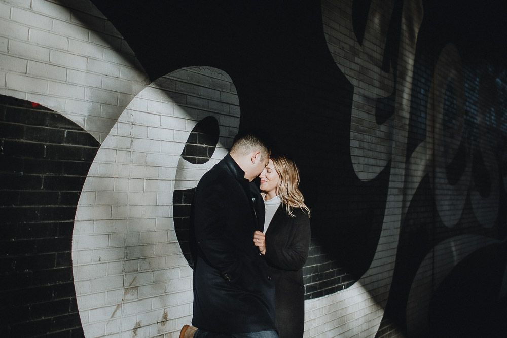 Couple during engagement photoshoot in dumbo brooklyn