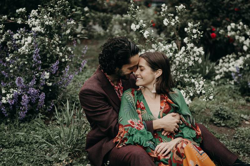 Couple snuggling in brooklyn park during elopement