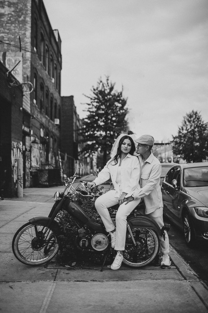 Couple during urban elopement in east williamsburg brooklyn