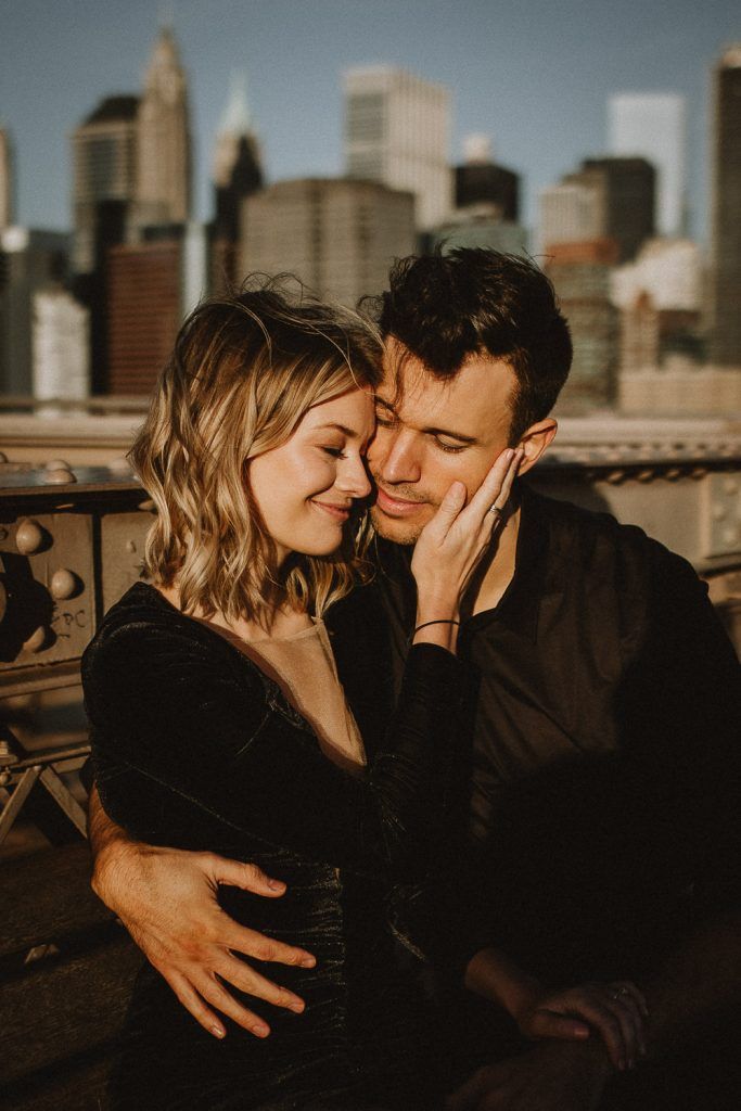 Couple on brooklyn bridge at sunrise during elopement photoshoot