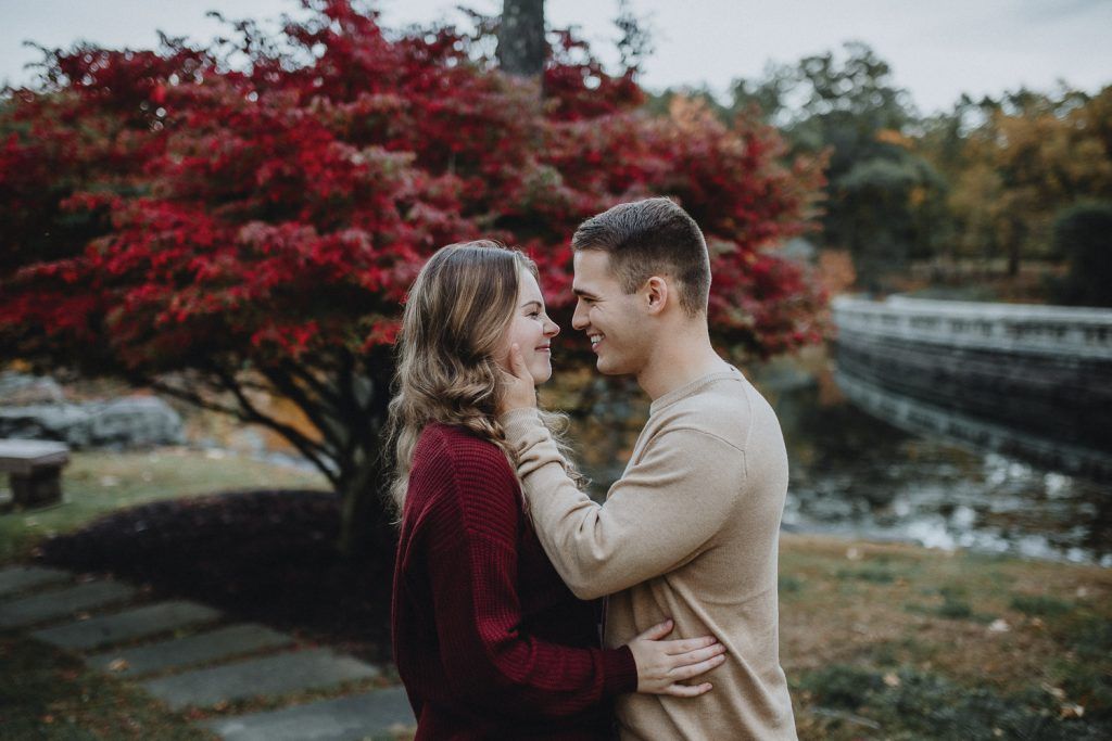 Couple during fall engagement photoshoot in west point