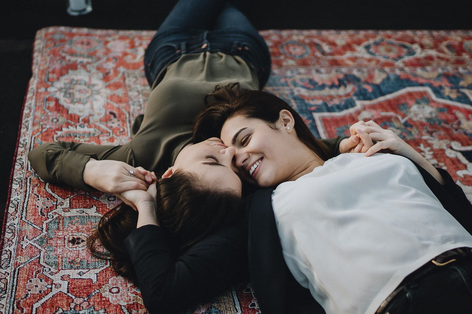 LGBTQ couple during engagement session on nyc rooftop