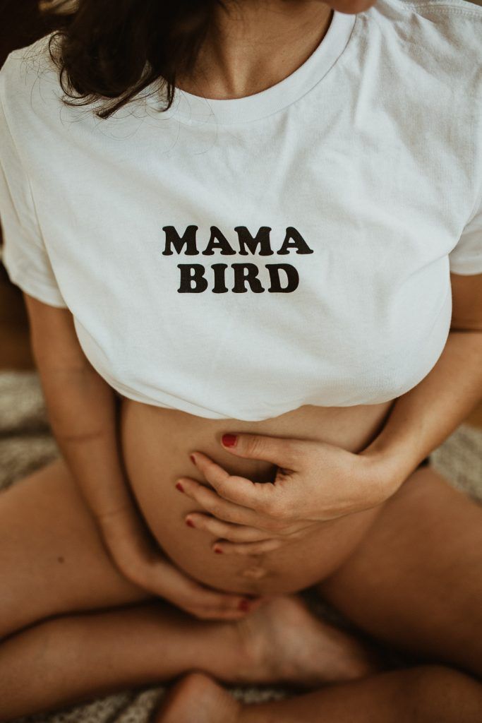 Pregnant woman during maternity photoshoot at home in brooklyn