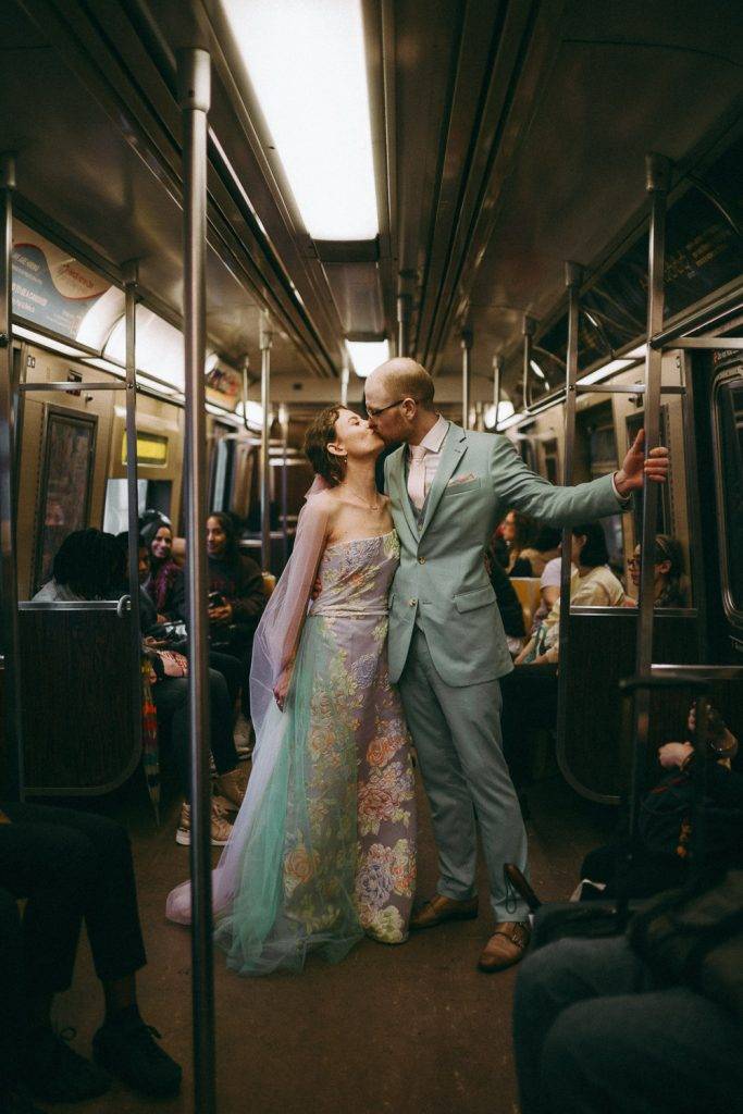 Bride and groom in nyc subway - by Lucie B. Photo brooklyn wedding photographer