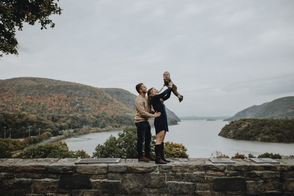 Parents and baby during fall family session in west point