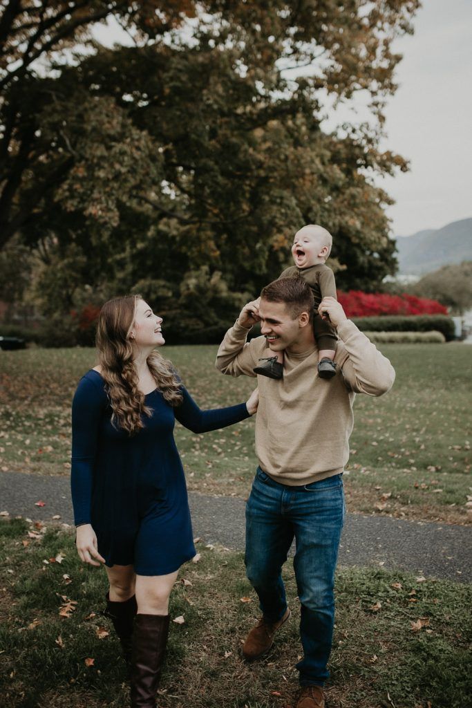 Parents and baby during fall family session in west point