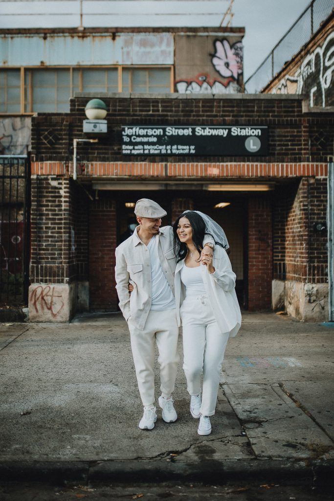 Couple during urban elopement in east williamsburg brooklyn