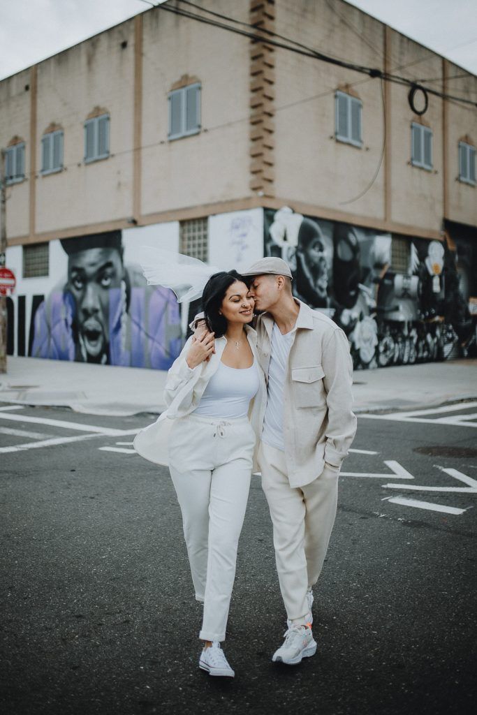 Couple during urban elopement in east williamsburg brooklyn